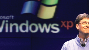 Windows XP 10 years old and Bill Gates on the right